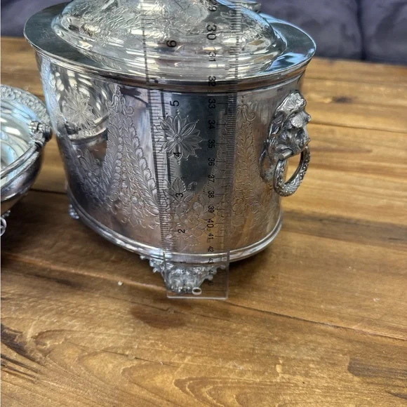 Stunning silver plated large footed bisc box with lions